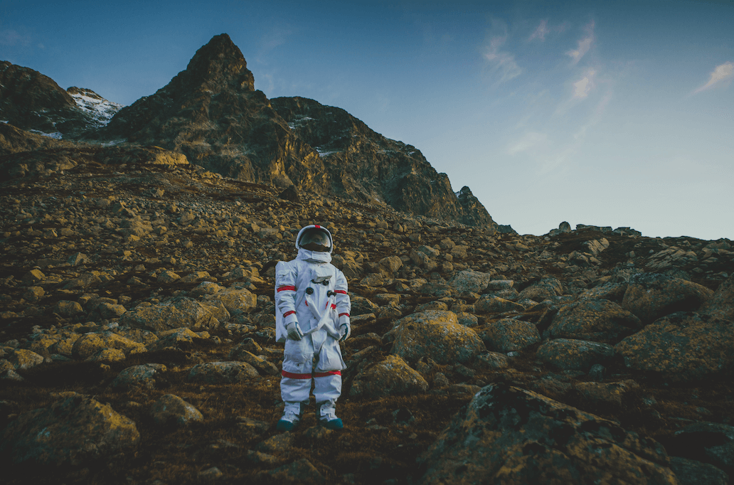 Astronaut exploring a new planet. by oneinchpunchphotos